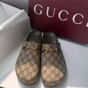 Gucci Tan Monogram Mules with Gold Accent